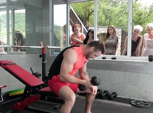 Hardcore group sex in the gym between one guy and mature sluts